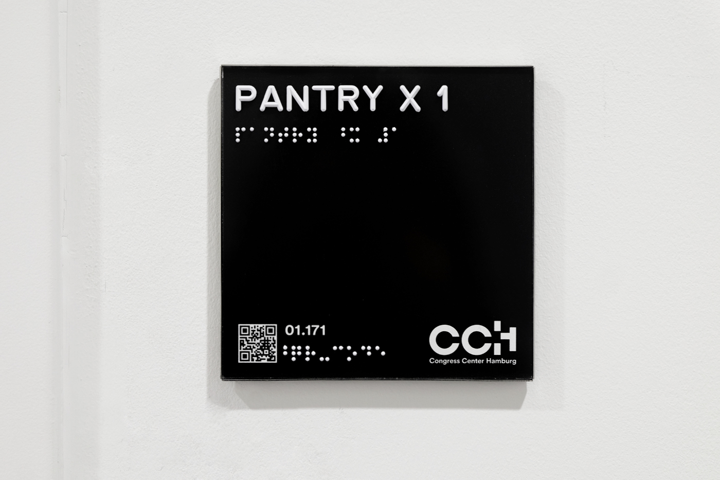 Accessible door sign (braille and tactile letters)