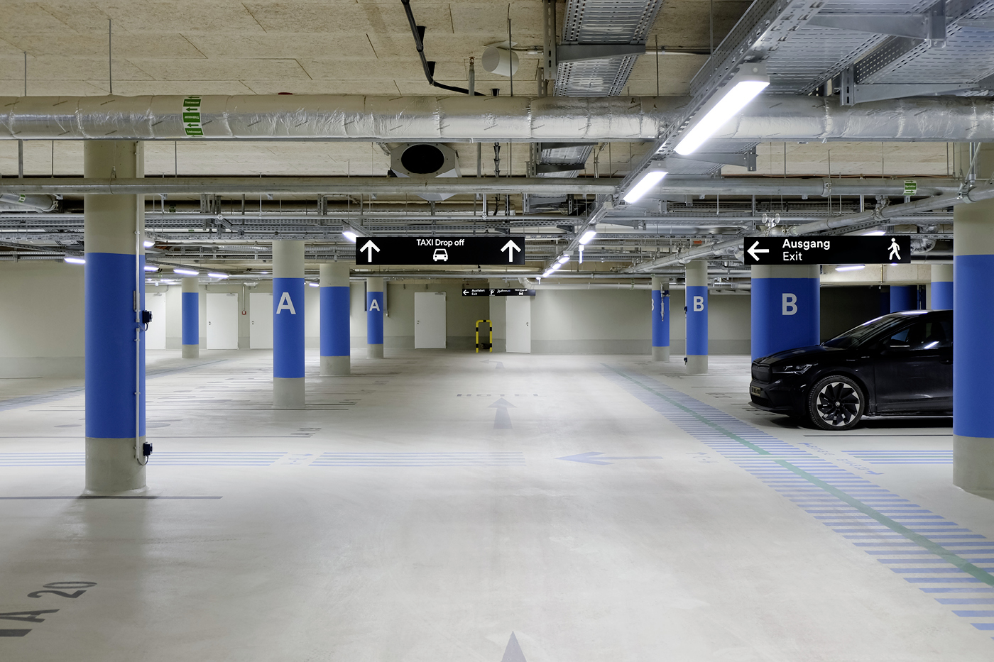 Directional signs and parking zone marking