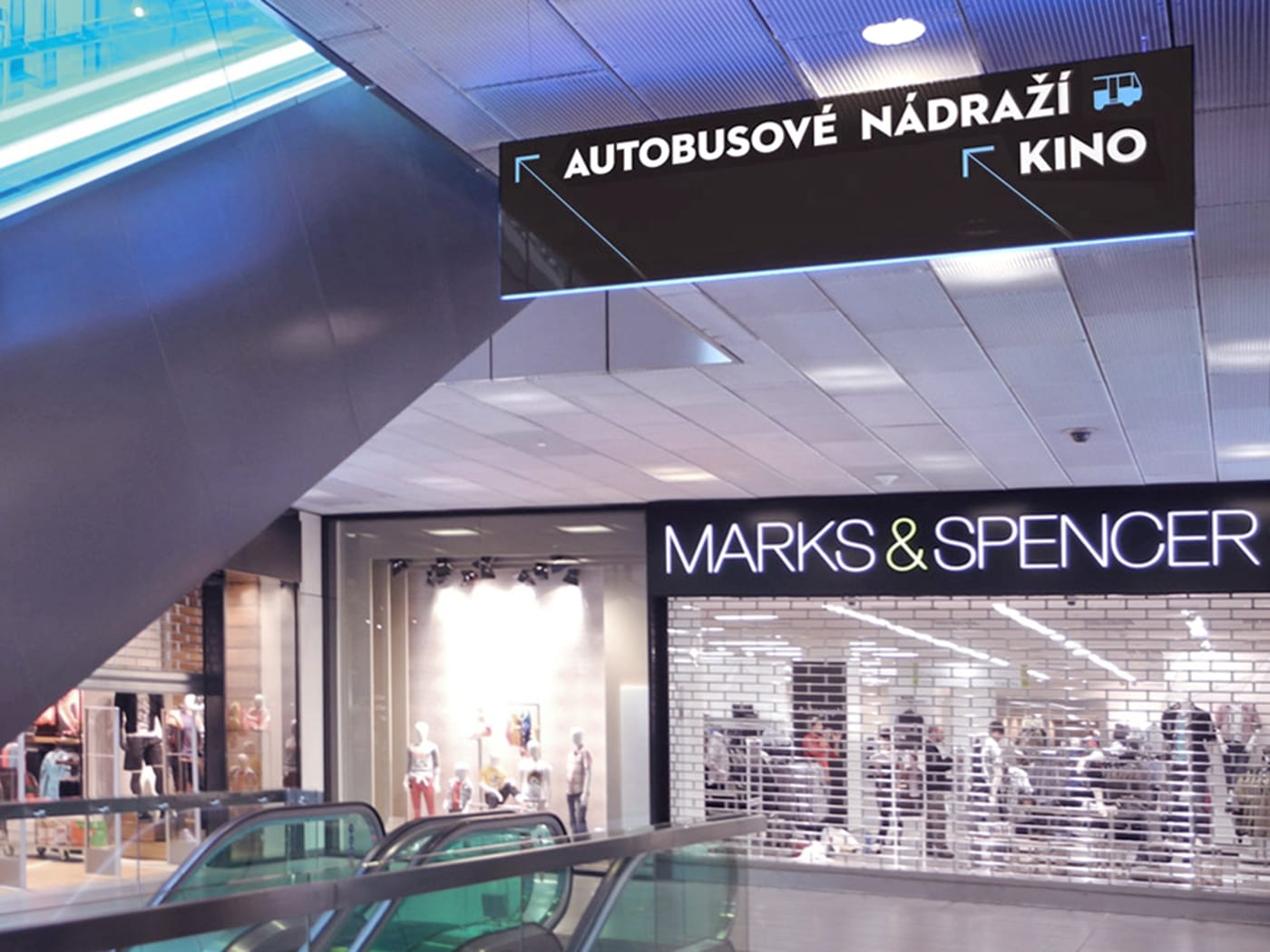 Suspended directional sign